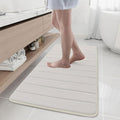 Buganda Memory Foam Bath Mat, 47" x 20", Ultra Soft and Non-Slip Bathroom Rugs, Water Absorbent and Machine Washable Bath Rug Runner for Bathroom, Shower, and Tub, Cream