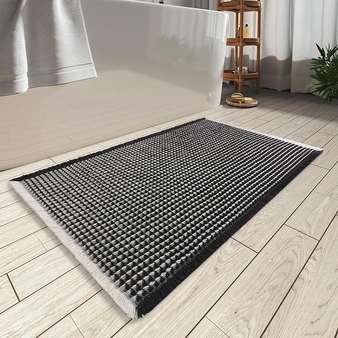 AMOAMI Upgraded Waffle Bath Mat, Super Absorbent Non Slip Bath Mats for Bathroom Floor, Machine Washable Bathroom Rugs with Tassels, Rubber Backed Bathroom Mats, Ultra Soft, 20" x 32",Black & Cream